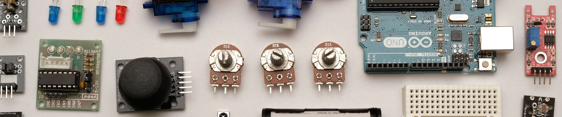 An image of an Arduino device and other Electric components